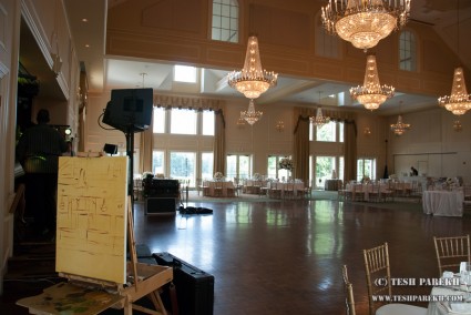 Live wedding painting in progress at the North Ridge Country Club